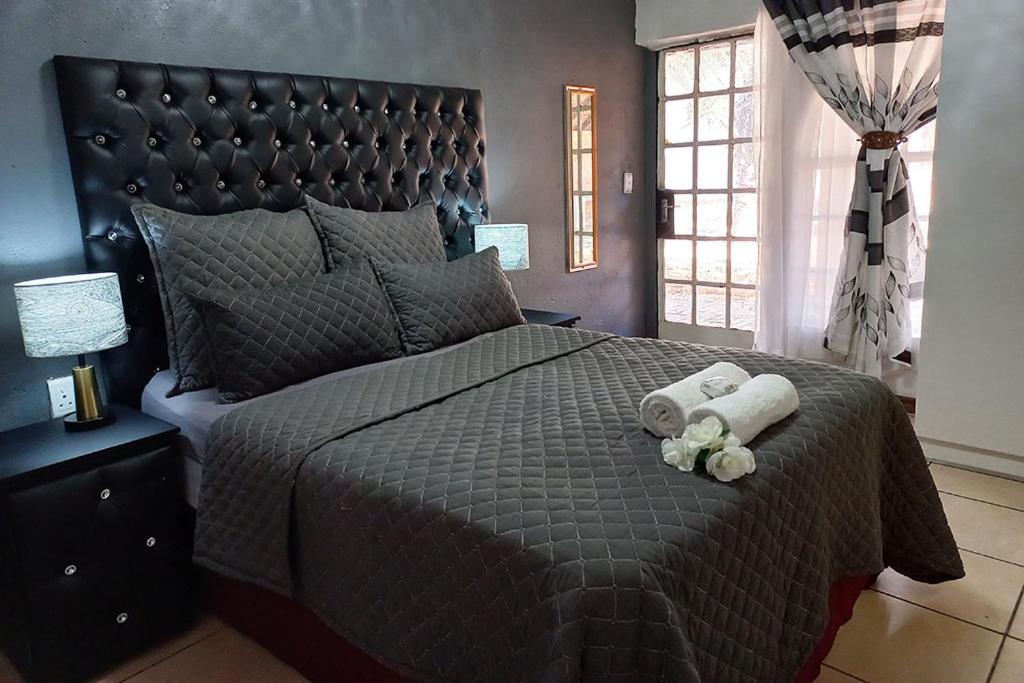 Queens Palace Pretoria-Noord Szoba fotó