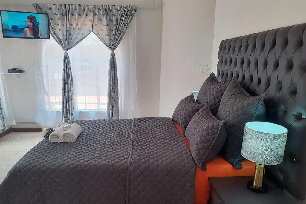 Queens Palace Pretoria-Noord Szoba fotó