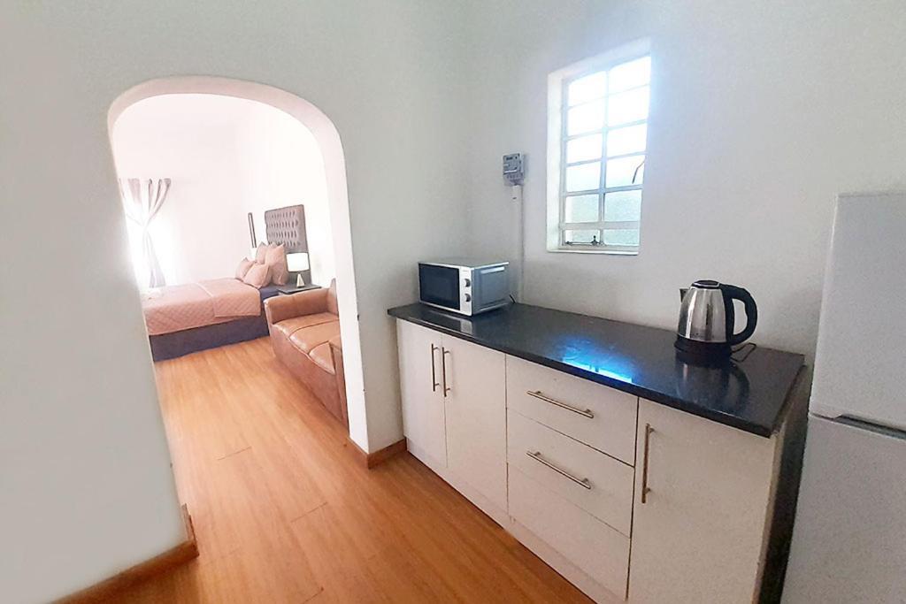 Queens Palace Pretoria-Noord Szoba fotó